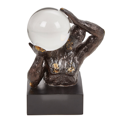 Person Holding Crystal Ball Statue